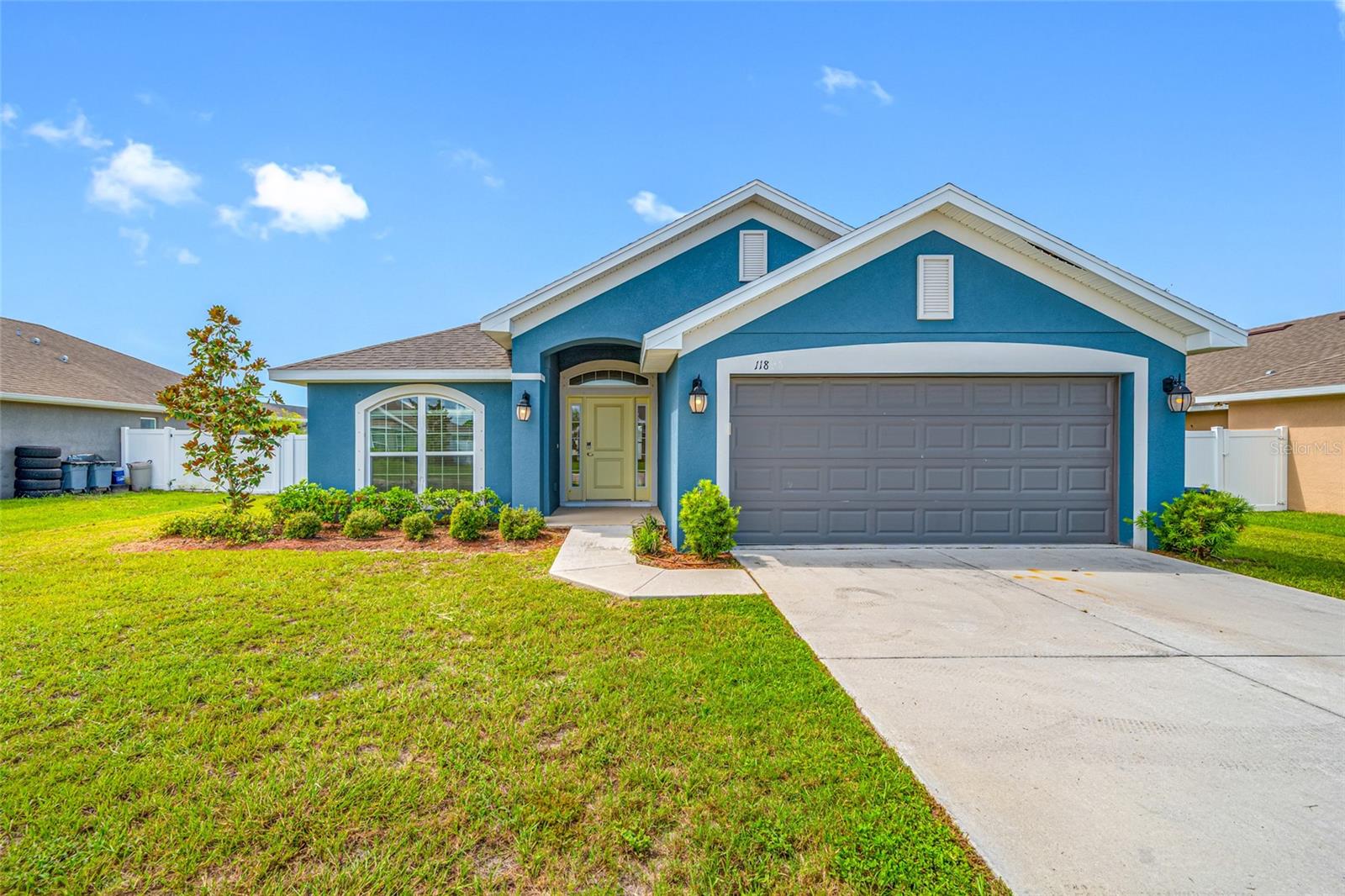 Are you dreaming of building a new home but dreading the time, stress, and hassle? Or perhaps you're tired of pouring money into an older property that just doesn’t meet your needs? Look no further – your perfect home is here! Welcome to this beautifully crafted 4-bedroom, 2-bathroom Adams Home, built in 2021, offering modern convenience, thoughtful design, and peace of mind. This home features a fantastic split floorplan, providing privacy and functionality. Three bedrooms, including a versatile front room that can serve as a study or 4th bedroom, are located on one side of the home, while the spacious main bedroom retreat is situated on the other. The kitchen is a chef’s dream, boasting granite countertops, wood cabinets, and upgraded appliances, with plenty of storage and space for a cozy breakfast nook. For formal gatherings, the separate dining room adjacent to the kitchen is perfect for hosting elegant dinners or large family meals. The great room offers a spacious and inviting area to relax or entertain guests.
The main bedroom is a true retreat, offering plenty of space for your furniture, a walk-in closet, and a private en suite bathroom with a stand-up shower.
The laundry room, conveniently located between the garage and kitchen, comes fully equipped with a washer, dryer, and shelving for easy organization. Step outside to your covered rear patio, perfect for grilling, lounging, or entertaining. The fully fenced backyard provides a safe and spacious area for pets to roam or the entire family to play. An irrigation system keeps your lawn lush and vibrant, while hurricane shutters and an innovative in-wall pest system give added protection and convenience.
This home was designed to last, with low-maintenance features and the remainder of the 10-year builder’s warranty, covering workmanship, materials, systems, and major structural defects. You can rest easy knowing your investment is protected. Skip the long wait and uncertainty of building a new home – this nearly new gem is ready for you! Whether you're looking for modern upgrades, spacious living areas, or a home built with durability in mind, this property checks all the boxes. Don’t miss out – schedule your private tour today and see why this home is perfect for you!