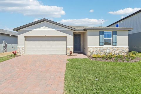 Photo of 907 Sand Sea Place, Haines City, FL 33844 (MLS # O6289553)