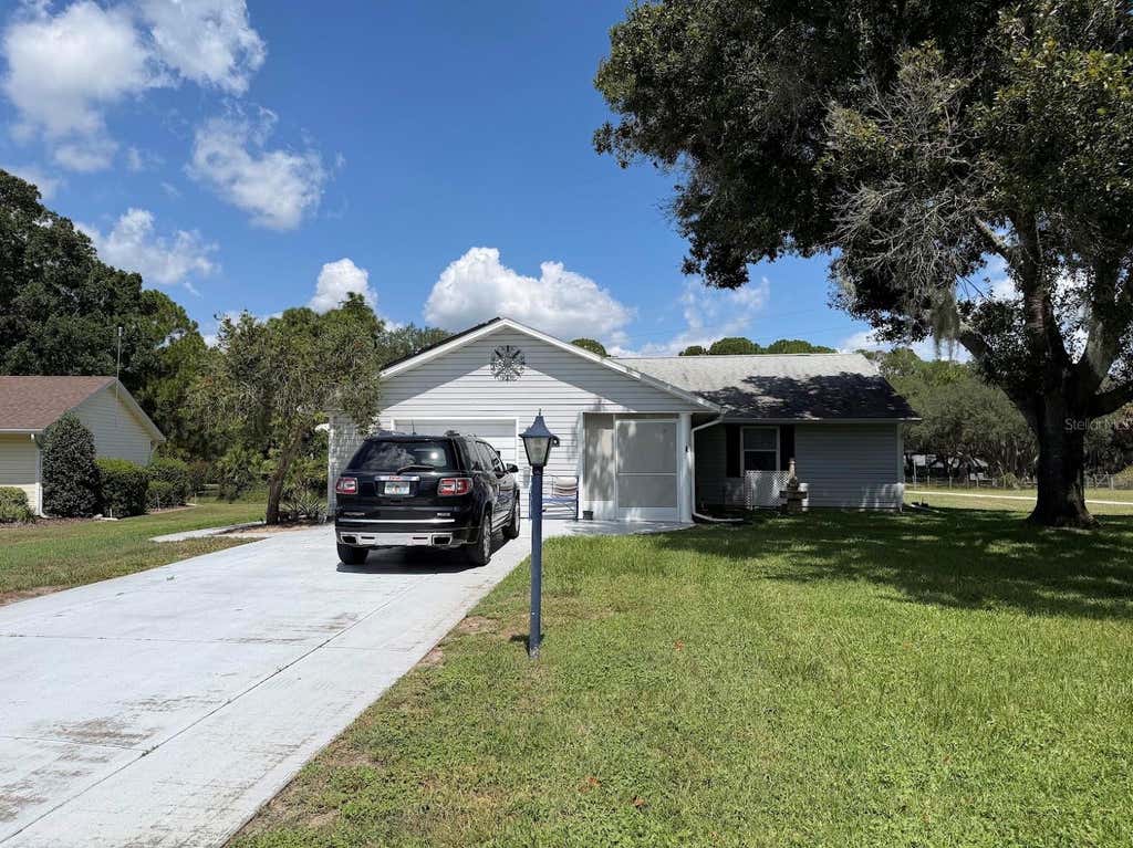 Photo of 1410 New Abbey Avenue, Leesburg, FL 34788 (MLS # G5116578)