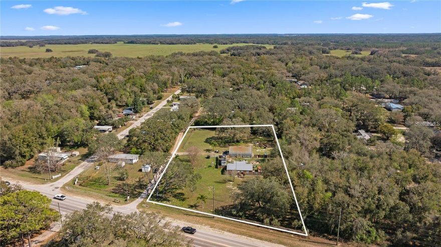 Massive opportunity! Situated on a spacious 2.10-acre lot, with steel shed on the property.  The value is in the land. Located in Spring Hill, Florida, this property offers loads of possibilities. The seller does not have a survey on the land. Structure is not warranted. Lot dimensions are approximate, no survey available.