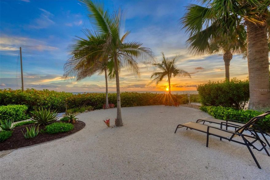Discover the pinnacle of gulf-front coastal living in this charming beach house, behind a private gated entry on desirable Casey Key. As you arrive at this spacious property, you'll be greeted by newly laid neutral stone and decorative walkways, guiding you to the front door with the breathtaking Gulf of Mexico as your backdrop. Step inside to find a meticulously renovated and modernized retreat, where impact windows and doors, along with thoughtful updates, enhance the home’s coastal elegance. The functional floor plan invites effortless living, beginning with a beautifully appointed kitchen featuring rich wood cabinetry, stainless steel appliances, granite countertops and a convenient breakfast bar. Adjacent, the inviting dining area is ideal for gatherings, anchored by a stylish gas fireplace that seamlessly divides the dining and living spaces. In the living room, a wall of sliders and expansive windows frame panoramic gulf views, flooding the space with natural light and showcasing mesmerizing sunsets. Just beyond, a beachside oasis awaits, where sea grapes, swaying palms and pristine white sands create a serene coastal escape. This property has undergone significant updates, including a new septic tank system and a new roof on the main home and covered carport, completed in June 2024. Enhanced landscaping adds privacy, while refreshed stone gravel and a newly detailed sidewalk ensure a low-maintenance, visually appealing setting. Additionally, the flood zone has been remapped from an AE flood zone to an X flood zone, and the home’s elevated construction provides peace of mind. Notably, there is no right-of-way access through the property for other Casey Key homeowners, ensuring privacy. Casey Key, an exclusive eight-mile residential island, offers an unparalleled lifestyle with breathtaking gulf views, pristine beaches, and endless opportunities for water sports or relaxed coastal living. Just moments away, Nokomis delights with its rich history, dining and leisure activities, while downtown Venice, Interstate 75, Sarasota and nearby airports provide easy access to the best of Florida’s Gulf Coast. This exceptional residence is a sanctuary of coastal sophistication and tranquility.