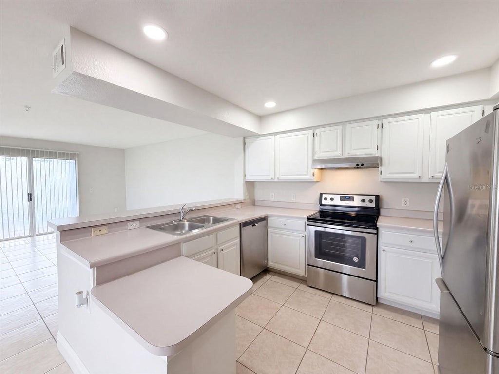 Photo of 13838 Fairway Island Drive #1411, Orlando, FL 32837 (MLS # O6449233)