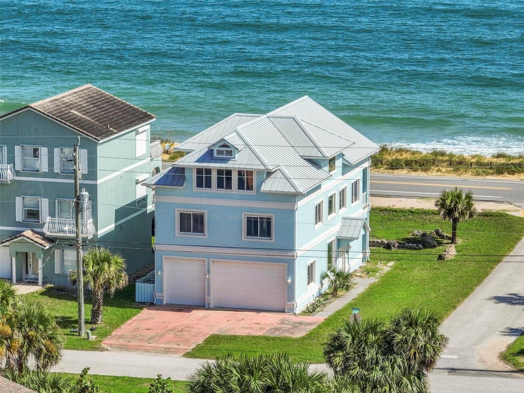 Photo of 2101 N Ocean Shore Boulevard, Flagler Beach, FL 32136 (MLS # FC322200)