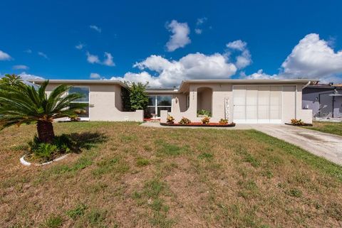 Photo of 9825 Aetna Lane, Port Richey, FL 34668 (MLS # TB8436812)