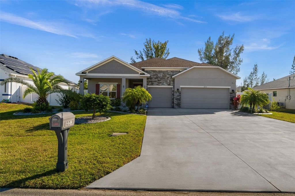 Photo of 2213 SW 7th Place, Cape Coral, FL 33991 (MLS # C7521239)