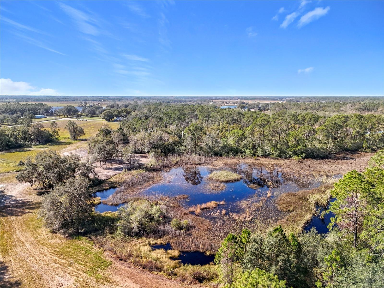 GROVELAND FARMS - Land