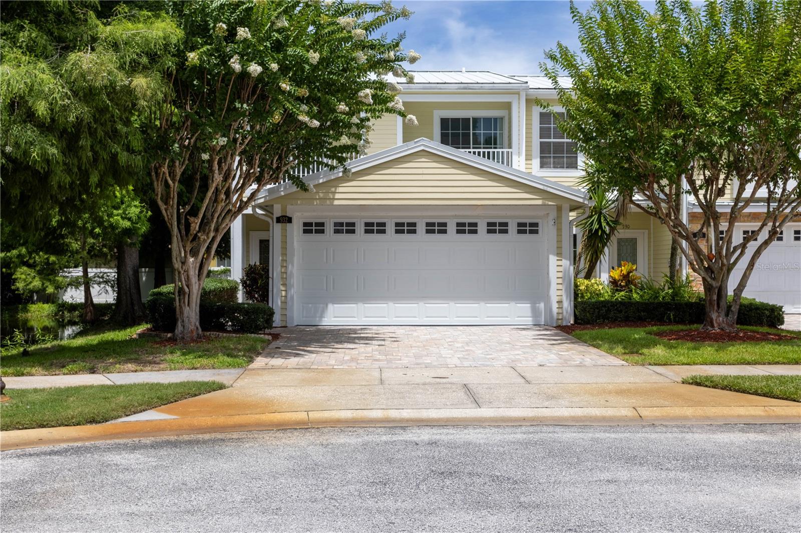 Imagine yourself waking up in a quaint Safety Harbor townhome just mere footsteps from Main Street. Early to rise, a short morning walk down to the pier will afford you a glimpse of the sunrise over Tampa Bay with manatees raising out of the shallow waters to say hello. On your walk home, you can order your favorite cup of Costa Rican brew to-go at Cafe Vino Tinto, or sit and mingle with other locals at the waterfront park before trekking off to work. If you want to make this lifestyle a reality, then schedule an appointment to visit this newly listed townhome today! Situated at the end of a cul-de-sac, this END UNIT townhome has tranquil views of the pond where turtles and birds play. Beautifully maintained, this home offers a spacious open floor plan with a highly desirable great room appeal for all your family living to take place. The kitchen opens to the great room over a quartz island and is complete with stainless steel appliances, 42' wood cabinets, a glass backsplash and a farmhouse sink. This townhome has a 2 CAR GARAGE and an interior laundry room and mud room. The closet fairy waived her magic wand and granted plenty of additional storage spaces to include an under-stairs closet, a walk-in closet in the master bedroom, linen closets and an indoor laundry room equipped with generous shelving. Pleasant outdoor living spaces include an extended and enclosed patio with a fully fenced backyard for your furry friends or little ones. UNEXPECTED EXTRAS INCLUDE: HVAC 2019, Washer/Dryer will convey, and low HOA fees that covers exterior building maintenance including lawncare. Happy Hour anyone? You are just a short walk to your local drinking and eating establishments like Gigglewaters, 8th Avenue Pub, Crooked Thumb Brewery and Sips Wine Bar. Weekend festivals and Third Fridays are in your backyard playground too … and you won’t have to think twice about arriving early to find parking. Schedule your private showing today - You aren’t just buying a home, you’re buying a lifestyle!