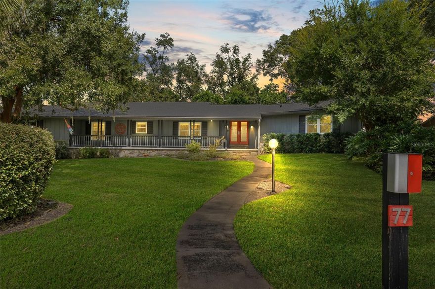 This beautifully-renovated, mid-century modern, ranch-style home is full of charm, warmth, and the kind of setting that makes everyday living feel special. Nestled in a friendly, established community, the home sits on a pastoral lot surrounded by mature trees and nearby, stately homes, with the peaceful Tomoka River in the background.  Tomoka Oaks is one of the most coveted neighborhoods in all of Ormond, offering a wide range of home styles, and a quiet, easy living that so many families find appealing.  Everyone loves the central aspect of Tomoka Oaks, where you can easily reach any number of conveniences, but at the same time, you have quiet streets and very little traffic. Inside the home, you’ll find a bright and open layout that celebrates the clean lines of mid-century design, updated with fresh finishes for today’s lifestyle. BRAND NEW, large windows have been installed throughout the house, bringing in natural light and framing views of the greenery outside, creating a comfortable connection between indoor and outdoor living.  Enjoy having NO carpeting in this home, with wood and tile flooring throughout, adding a modern and clean feel.  This home offers four large bedrooms and three bathrooms, so it has plenty of space for the entire family.  As you enter the foyer, you are greeted by an open floor plan, and you immediately notice the large great room with an electric fireplace, and French doors to the outside.  Notice the beam ceilings, the continuous Pergo wood flooring, and the light and bright interior.  The eat-in kitchen with a breakfast bar features stainless appliances, a huge stainless sink, a tile backsplash, a pantry, and plenty of space for entertaining.  The fourth bedroom is set apart from the others and is a very large size, making it perfect for an in-law arrangement, a children's play area, an office, or a workout room.  You will enjoy the large laundry room with plenty of space for storage, and the well-organized, three-car garage that offers a myriad of storage options and can house multiple vehicles, toys, and work equipment. Step out back and enjoy your own private oasis — a sparkling, screened pool, shaded yard, and plenty of room to gather with family and friends. It’s the kind of place where summer barbecues, quiet mornings with coffee, and afternoons in the yard all feel right at home. For those looking for more space, an additional lot, available for purchase, extends all the way through to the street behind — a rare chance to grow into the property, enjoy the privacy of the green space, or create something new. 
This is more than a home — it’s a place to put down roots, connect with neighbors, and enjoy the beauty of nature just outside your door.
All information taken from the tax record, and while deemed reliable, cannot be guaranteed.