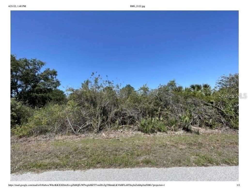 Photo of 7470 Riverton Circle, Port Charlotte, FL 33981 (MLS # A4665700)