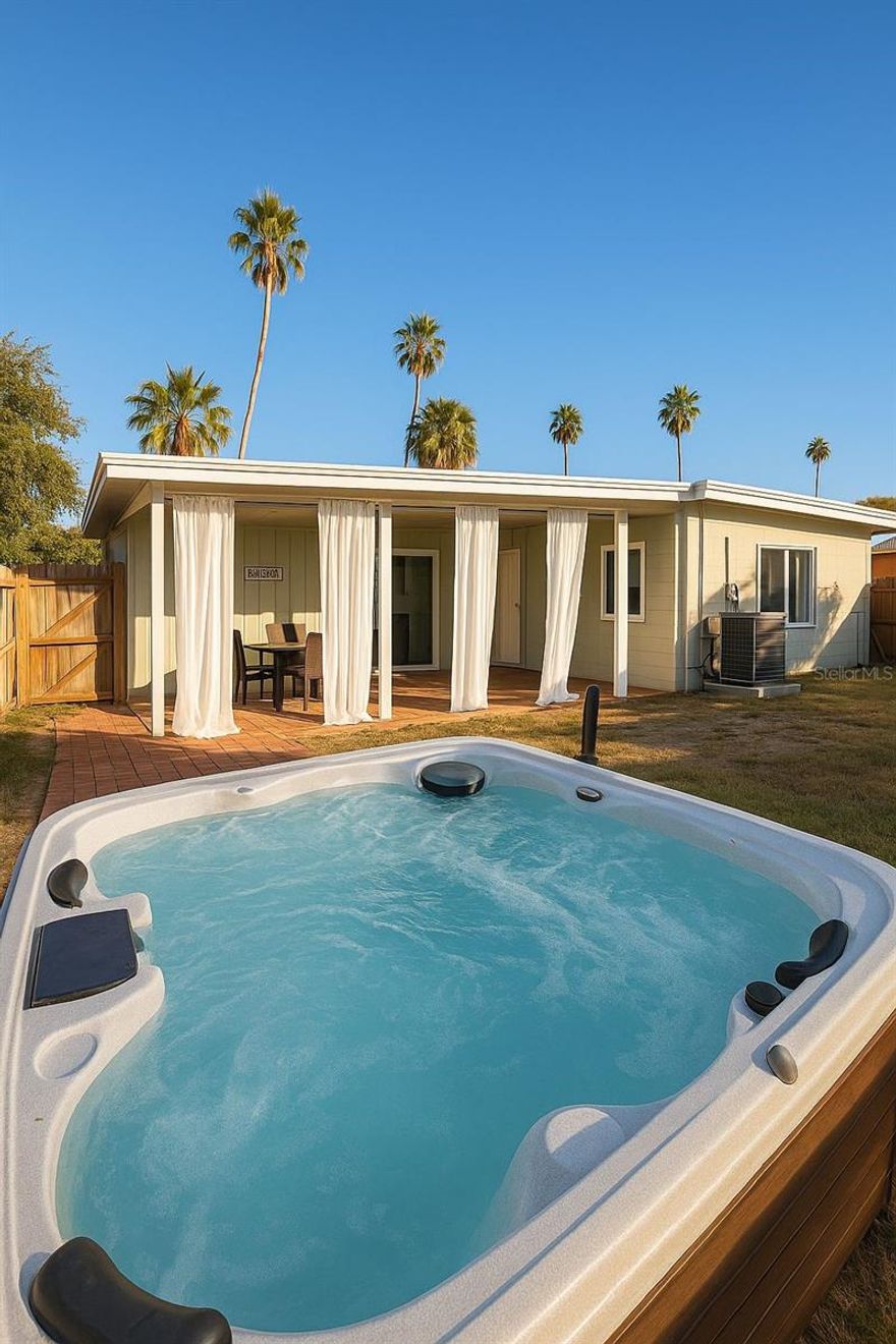 FULLY FURNITURE 3-bedroom, 2-bath home, feature comfortable queen-size beds, elegant décor, and spacious closets.
The third bedroom includes a twin-over-twin bunk bed, 
Modern open kitchen showcases a stylish backsplash, quartz countertops, stainless-steel appliances, and a convenient breakfast bar.
A dining area for six and a cozy living room with smart TV create the perfect space for gathering and entertainment.
Washer and dryer included for added convenience.
Step outside to enjoy a spacious backyard with a beautiful terrace, outdoor sitting area, and lush green lawn—ideal for relaxing or spending quality time with loved ones.
Indulge in your own private jacuzzi, unwind under the sun, and enjoy the peaceful atmosphere.
Available for short-term or monthly stays, this modern residence offers everything you need for an unforgettable stay near Downtown St. Petersburg.Located in a quiet and welcoming neighborhood, just minutes from vibrant Downtown St. Petersburg, the St. Pete Pier, local restaurants, art galleries, and coffee shops. A short drive will take you to the award-winning Gulf beaches such as St. Pete Beach, Treasure Island, and Clearwater Beach. The home is also conveniently located about 30 minutes from Tampa International Airport, making it perfect for travelers flying in.
This property is ideal for families, couples, or professionals seeking a stylish and peaceful retreat close to everything St. Petersburg.
Enjoy a stay where comfort, design, and location come together to create an unforgettable experience.