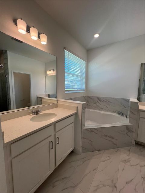 Tiny photo for 1698 Cadence Street, Minneola, FL 34715 (MLS # G5101220)