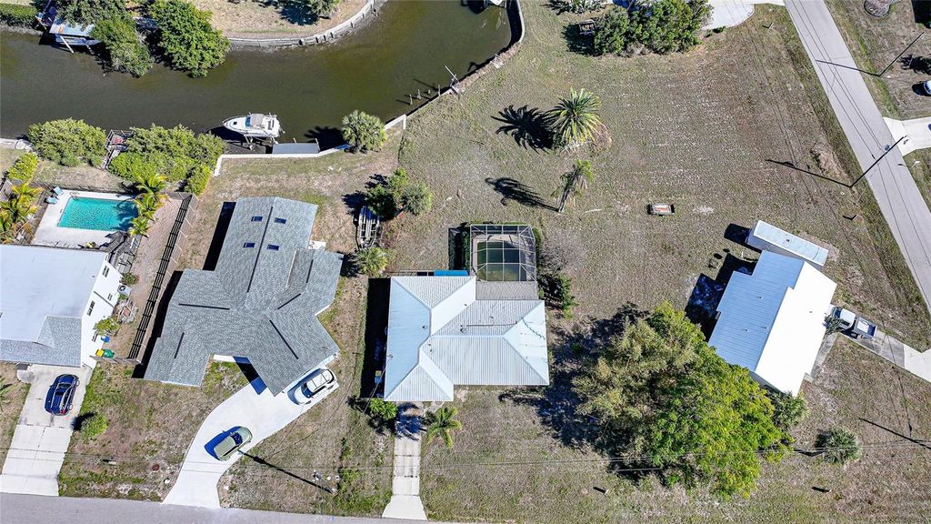 Photo of 157 Deerfield Avenue NE, Port Charlotte, FL 33952 (MLS # D6145852)