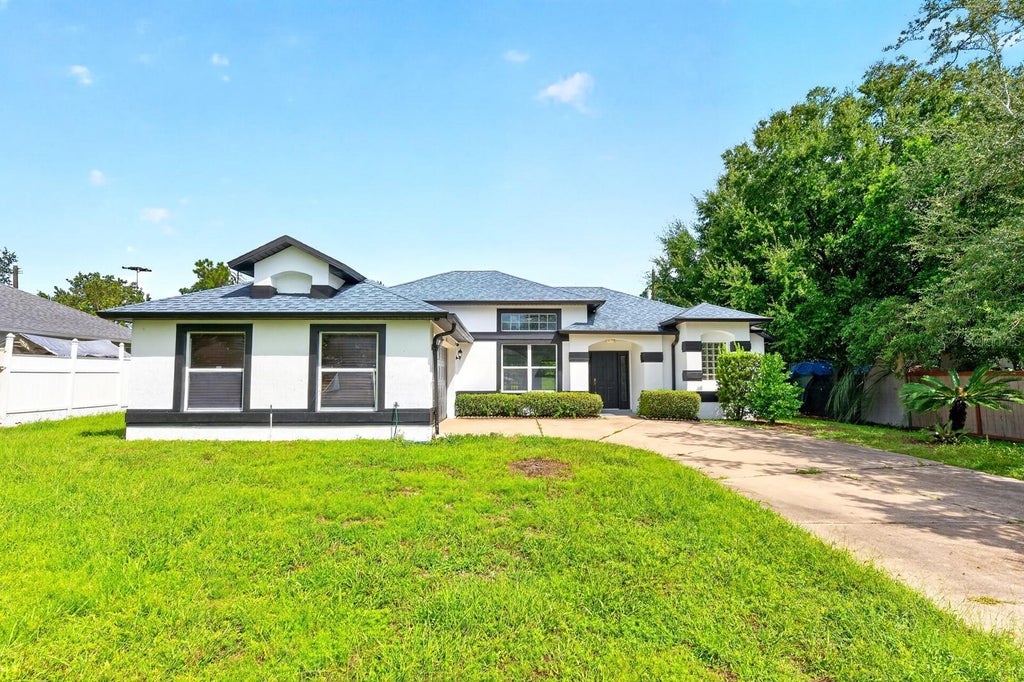Photo of 1448 Hollyhock Street, Deltona, FL 32725 (MLS # V4951384)