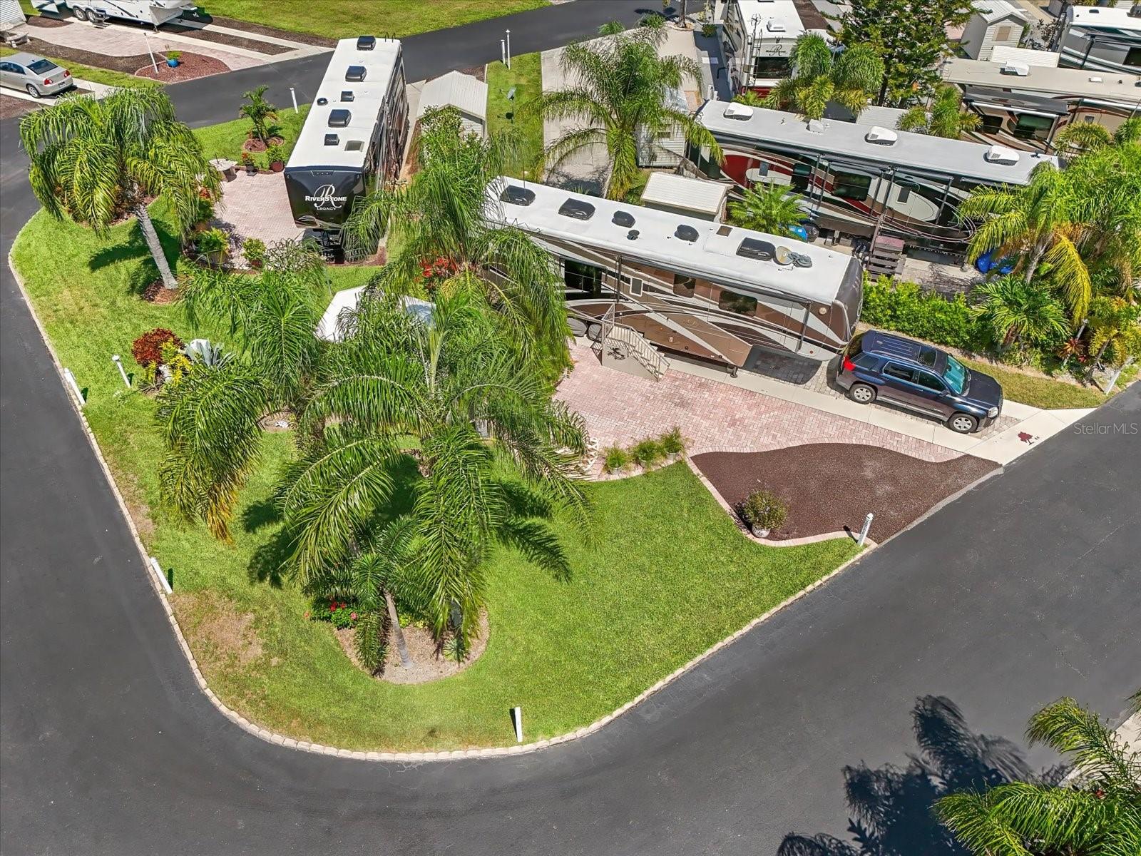 Oversized Corner Lot in the Sought-After 55+ Torrey Oaks RV Resort – Owner Financing Available!
Enjoy the Florida RV lifestyle! This oversized corner lot in the 55+ Torrey Oaks RV Resort is ready for your Fifth Wheel or Class A motorhome, offering plenty of space to spread out and relax under the swaying tropical palm trees. The lot includes a power supply hookup, a stone picnic table, and a 6x10 shed with electric, giving you extra storage and convenience. Whether you're planning to settle in full-time or enjoy it seasonally, this lot is perfectly positioned to take full advantage of everything this vibrant community has to offer. HOA covers the watering and mowing of the lot too.
Torrey Oaks is more than just an RV park—it’s an active adult resort designed for connection, recreation, and comfort. Residents enjoy access to a huge list of resort-style amenities, including a heated swimming pool, pickleball and shuffleboard courts, a fitness center, card/game room, billiards hall, library, and dance hall with a commercial kitchen. There are two laundry facilities, outdoor gazebos, BBQ areas, a tool-sharing station, and even a rentable clubhouse room for private parties. Plus, a dog park, fishing pond, and free Wi-Fi in the lounge too.
The resort spans 22 acres with 232 deeded RV sites, offering peace, privacy, and lush landscaping in a prime location. Torrey Oaks is just north of Wauchula in South Central Florida, close to public golf courses, local dining, and shopping—and within a reasonable drive to Central Florida’s top attractions like Disney, Universal Studios, Busch Gardens, and the Peace River for canoeing, fossil hunting, and more.
If you're searching for a relaxed but active lifestyle, and plenty of amenities, this lot is your opportunity to make Torrey Oaks home. Owner financing is available, making it easier than ever to own your slice of paradise. Come visit today and picture the endless possibilities!