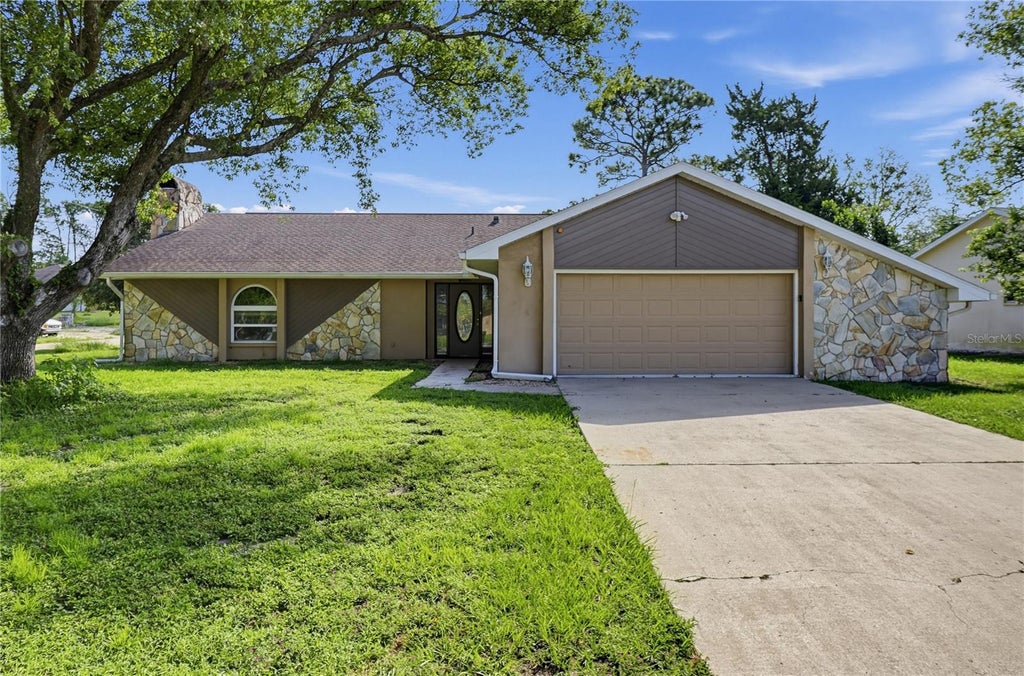 Photo of 7488 Allen Drive, Spring Hill, FL 34613 (MLS # O6442202)