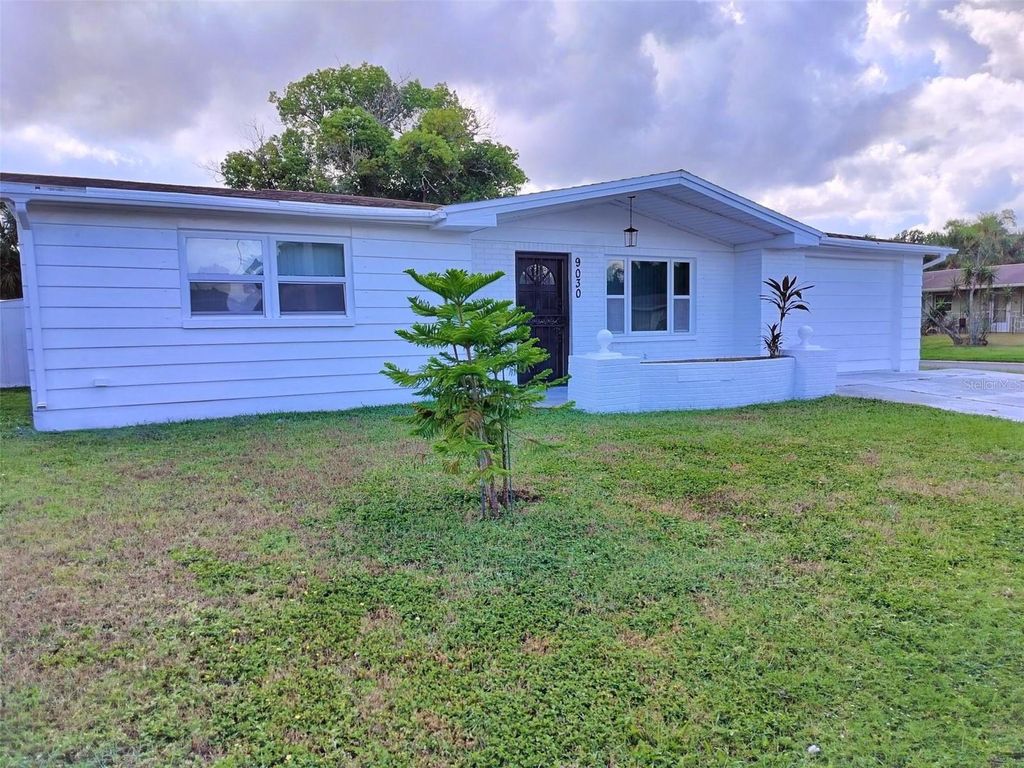 Photo of 9030 Pegasus Avenue, Port Richey, FL 34668 (MLS # TB8434158)