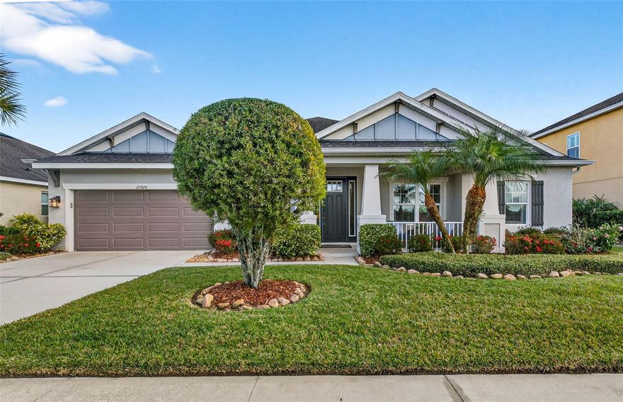 ***Highest and Best Offer Due by 6:00PM Wednesday, January 14th *** 
Welcome to luxury living in the gated community of Arbor Woods. This elegant 4-bed, 3.5-bath, 
3,211 sq ft home showcases an oversized, open floor plan enhanced by tray ceilings, detailed 
crown molding, custom designer paint, wainscoting, and high-end finishes throughout. The home was a Custom Build to be a Model replica of the Windmore III by Taylor Morrison.  A grand foyer leads to a formal dining room and a sophisticated office with French doors, framed by 
architectural archways and rich accent walls. The spacious great room flows seamlessly into the 
gourmet kitchen and out to a screened in, oversized lanai fully appointed outdoor kitchen with 
natural gas grill, separate burners, sink and beverage fridge. All overlooking a serene private 
pond & conservation. Premium tile flooring, curated lighting, whole home crown molding, and 
beautifully coordinated décor elevate every space. The generous floor plan has plenty of room 
for everyone, with a spacious Bonus room and full bath with Lania access – perfect for a future 
pool.  A fully integrated Surround Sound, and Flat Screen Televisions (all convey with purchase) 
is zoned for ultimate entertainment. This Taylor Morrison home is thoughtfully designed for 
multi-generational/family living with a split wing floor plan.  Traditional features like a Jack & 
Jill bathroom, large closets, Butlers Pantry and nicely appointed Laundry room as well as a 
tandem 3 car garage round out the homes incredible design.   Enjoy gorgeous Florida sunsets 
from your covered front porch, the community pool and playground is just steps away from 
your door. Located in the top-rated Wiregrass school Zone, this home blends timeless design 
with upscale Florida living. Close to everything Wesley Chapel has to offer with access to I-75 
and Tampa’s Premium Outlets, The Shops at Wiregrass and three Hospitals all within 3 miles 
away. The Gulf Coast Beaches and Disney World less than an hours drive.