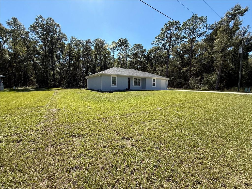 Photo of 19672 SW 59th Lane, Dunnellon, FL 34431 (MLS # OM712160)