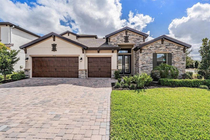 Welcome to a home where space, style, and the Florida lifestyle come together beautifully in the highly sought after master planned community of North River Ranch. As you arrive, the home captures your attention with its modern yet timeless exterior, impressive curb appeal, manicured landscaping, and inviting front entry. Step inside to an expansive, light filled interior that feels both elegant and welcoming. With 4 bedrooms, 4 full bathrooms, and 3,172 square feet of thoughtfully designed living space, this home offers a perfect blend of open concept living and private retreats for work, relaxation, and entertaining. Just off the entry, a dedicated office provides an ideal space for working from home or studying. Continue inside to a stunning main living area where soaring ceilings and abundant natural light create an airy atmosphere. At the center of the home is the beautifully designed kitchen, combining style and function with abundant cabinetry, generous counter space, modern appliances, and a large extended island with wrap around storage. The kitchen naturally becomes the gathering place of the home, flowing seamlessly into the dining area and spacious great room.
The great room offers a comfortable setting to unwind or entertain, with large windows framing views of the backyard and allowing Florida sunshine to fill the space. The primary suite serves as a private retreat tucked away for comfort and tranquility. The spacious bedroom offers room to relax, while the ensuite bath features dual vanities, a large walk in shower, and dual walk in closets designed to keep everything organized. A standout feature of the home is the large bonus room, a versatile space that can easily become a media room, game room, playroom, or second living area depending on your lifestyle. Step outside to the covered lanai where you can embrace Florida living. Whether enjoying morning coffee or hosting gatherings, the outdoor space extends your living area and offers a setting for year round enjoyment. The three car garage provides ample room for vehicles, storage, hobbies, or a golf cart. Beyond the home itself, life in North River Ranch offers an exceptional lifestyle. This award winning community features resort style pools, fitness centers, clubhouses, pickleball courts, playgrounds, and miles of scenic walking and biking trails. Community events and gathering spaces create an atmosphere where neighbors quickly become friends. Located in the growing town of Parrish, North River Ranch offers peaceful suburban living with convenient access to the Gulf Coast. With easy access to Interstate 75, residents can quickly reach Tampa, St. Petersburg, and Sarasota for dining, shopping, entertainment, and beautiful Gulf beaches. The community is also surrounded by nearby top rated schools. With its spacious design, luxury features, flexible living spaces, and prime location, this remarkable home offers the perfect combination of comfort, convenience, and community. This is more than just a place to live. It is a place to truly feel at home.