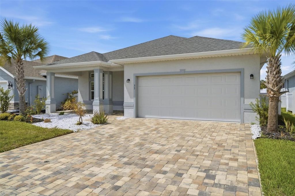 Photo of 55 Matanzas Lakes Drive, Palm Coast, FL 32137 (MLS # FC317393)