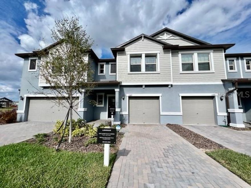 WELCOME TO YOUR AMAZING HOME at 21827 Adriatic Ln, Land O Lakes in the UPSCALE community of Connerton in sunny FL. This BRAND NEW 2022 TOWNHOUSE features 3 bedrooms, 2.5 bathrooms & 1 car garage. This is the decorated MODEL HOME that the builder used to showcase the POPULAR Mulberry floor plan. As you step into the expansive foyer, you'll LOVE the ceramic tile floors throughout the entire first level, high ceilings, CRISP paint color & LED recessed lighting. The FABULOUS light & bright kitchen features SLEEK appliances, granite counters, expansive center island BEAUTIFUL shaker-style white wood cabinets with MODERN hardware & walk-in pantry closet. NATURAL SUNSHINE streams through the multiple DOUBLE-PANE, THERMAL TINTED, LOW-E windows that can open inward for easy breezy cleaning. The windows are dressed with custom fitted blinds as well as curtain rods with high-end drapes. The first level consists of the foyer, kitchen, half-bath, living & dining rooms. The covered & SCREENED lanai with backyard access is off the dining room. The second level consists of the primary bedroom with its private bathroom, 2 more secondary bedrooms with the full bathroom, laundry room & spacious loft space. The MARVELOUS main bedroom can easily accommodate king-size furniture & has a walk-in closet. The feature wall with molding accents will make your bedroom feel like a 5-star hotel. The private bathroom features matching cabinet vanity, expansive counters, dual sinks & SENSUAL step-in shower with glass enclosure where all your worries of the day can melt away. In this split bedroom plan, the other 2 bedrooms are located on the opposite side along with the full bathroom with tub/shower combination nearby. A washer & dryer are included for personal use. Rent includes all outside lawn/pest maintenance & water/sewer utilities & all the PHENOMENAL community amenities. Amenities include resort-style pool, splash pad, junior size Olympic lap pool, outdoor kitchen with grills, tennis courts, pickle ball courts, sand volleyball court, outdoor amphitheater, open green spaces, multipurpose meeting rooms, gym, cyber cafe, playgrounds & trails throughout the neighborhood. Freshly constructed homes like this do not come on the market often as rentals. MAKE THIS YOUR FUTURE HOME!