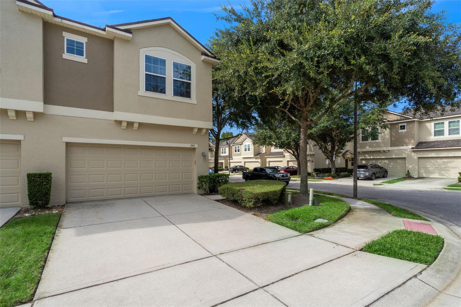 Welcome to this beautifully maintained 3-bedroom, 2.5-bath END UNIT townhome in the highly sought-after community of Arborview Park in Oviedo! With a NEW roof (2023), NEW A/C (2025), and NEW water heater (2025), this home offers true peace of mind—simply move right in and enjoy worry-free living. Inside, you’ll love the spacious open layout with plenty of natural light. The kitchen flows seamlessly into the living and dining areas, perfect for entertaining or relaxing with family. Upstairs, generously sized bedrooms provide comfort and privacy, including a well-appointed primary suite with ample closet space. Step outside to your lanai and take in the serene water view—a perfect spot for morning coffee or evening relaxation. As an end unit, you’ll appreciate the added privacy and extra natural light. Arborview Park is a smaller, quiet community ideal for evening walks to the playground or pool. You’ll also love the convenience of being just a short walk to nearby restaurants, shops, and everyday essentials. This townhome checks every box—prime location, move-in ready updates, and a lifestyle of comfort and convenience. Don’t miss your chance to call Arborview Park home!