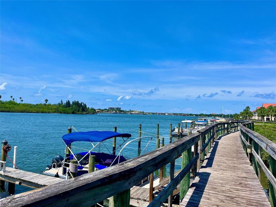 Direct Intracoastal Condo with Fantastic Views of the Intracoastal Waterway, Sunsets, Dolphins and more.  This Impeccably Fully Furnished Remodeled Home with Vinyl Plank Flooring, Granite Counters throughout, Beautiful Bar Area with Wine Cooler, A/C new 2023, plus the 24' x 9' porch has been incorporated into the living space bringing Sunlight and Sweeping Views of the Intracoastal Waterway down to the South Bridge.  Look no further for your piece of Paradise in New Smyrna Beach.  This Model style Home is ready for you to move into, just bring your Bikes and Fishing Poles.  New Roof 2022 and Painted 2023. Bouchelle Island has so much to offer with a 18 Hole Pit and Put Golf Course, 2 Swimming Pools, Hot Tub, Fitness Centre, Tennis, Pickleball, Shuffleboard, Clubhouse, Boat Slips for Rent, Dry Boat Storage and Private Boat Ramp, Kayak Storage, Entertainment Area with Fire Pit.  Bike or Walk  to the Famous Flagler Avenue and Canal Street filled with Restaurants and Shops. 13 FT Boston Whaler available as a separate sale. ;Water: City