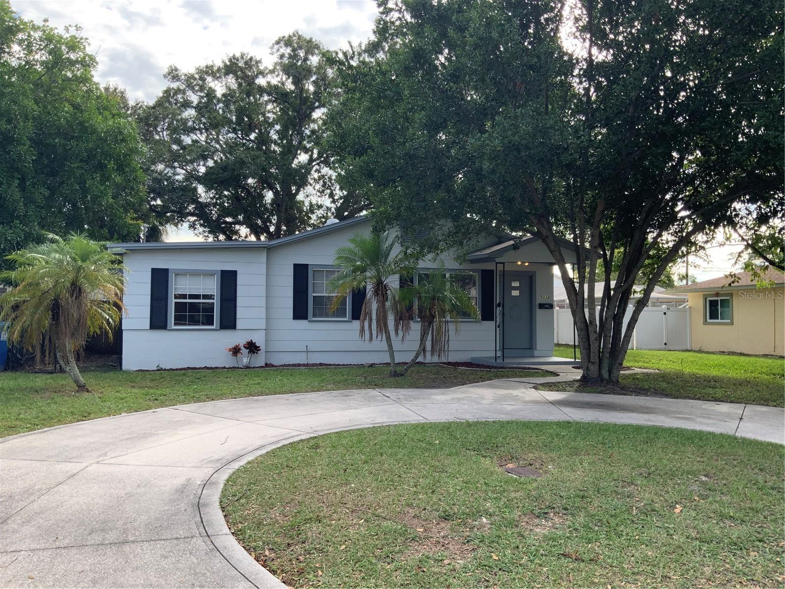 Don't miss this! Completely remodeled 3 bedroom/2 bath home in the heart of St. Petersburg. Beautiful kitchen with white cabinets and granite counter top. All new stainless steel appliances including washer and dryer. New flooring throughout. Fresh interior paint with bright white woodwork. Fireplace in the living room for enjoying the cool evenings. Both bathrooms are completely remodeled with floor to ceiling tile in both showers. The master bedroom has a large walk in closet. The other bedrooms are nicely sized with adequate storage. Circular driveway. Fenced back yard features an oversized wood deck for grilling or entertaining. In Law suite attached for an additional $500/month. All utilities included. Nice storage shed in back yard. Electric, water, trash and sewer included!