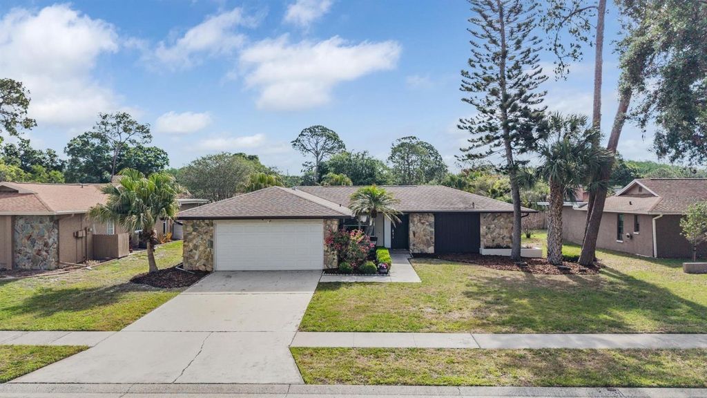 Photo of 3643 Fairway Forest Circle, Palm Harbor, FL 34685 (MLS # TB8499957)