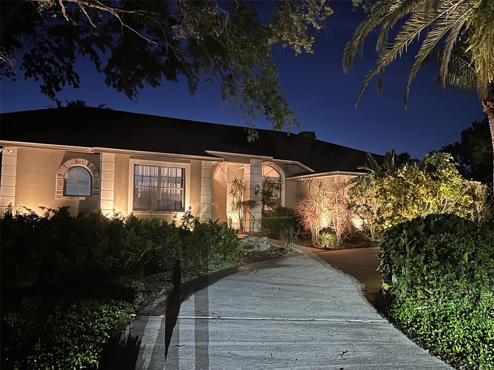 *NO Flood Zone ** Welcome to your dream home in this gorgeous waterfront community of "Sail Harbor," a true suburban paradise offering peaceful seclusion and privacy. This beautiful 4-bedroom, 3.5-bath residence sits on nearly an acre of lushly landscaped grounds, providing ample space for outdoor Florida living at its best. As you step inside, you'll be greeted by soaring vaulted ceilings and an abundance of windows that flood the space with natural light, creating a bright and airy atmosphere. The formal living and dining rooms are perfect for entertaining guests, showcasing elegant design and sophistication. The expansive kitchen is a chef's delight, featuring granite countertops, an abundance of cabinets, and stainless steel appliances. A large breakfast bar with pendant lighting opens to the spacious family room, complete with a cozy wood-burning fireplace, making it an ideal spot for family gatherings. Enjoy your morning coffee in the breakfast room, which offers stunning views of the oversized pool and spa. The pool area, with its screen enclosure and spill-over spa, provides a private oasis for relaxation and entertainment. A large covered lanai ensures you can enjoy the outdoors in any weather. The split bedroom plan offers privacy and comfort, with a luxurious primary suite that boasts high ceilings and generous space. The oversized side-load garage and circular driveway provide convenience and ample parking for guests. "Sail Harbor" residents enjoy access to a community boat ramp, perfect for launching your boat or Kayak and taking a short ride to the Gulf of Mexico. The location is just minutes from downtown Tarpon Springs, home to the world-famous Sponge Docks, offering a rich cultural experience and a variety of dining and shopping options. Don't miss to attend festivals and events though out the year along the Sponge Docks. Enjoy biking on the nearby Pinellas trail or visiting the nearby Honeymoon Island or Clearwater beach. Don't miss this opportunity to live in one of the best subdivisions in the area. Embrace the luxury, comfort, and waterfront lifestyle that "Sail Harbor" has to offer.
