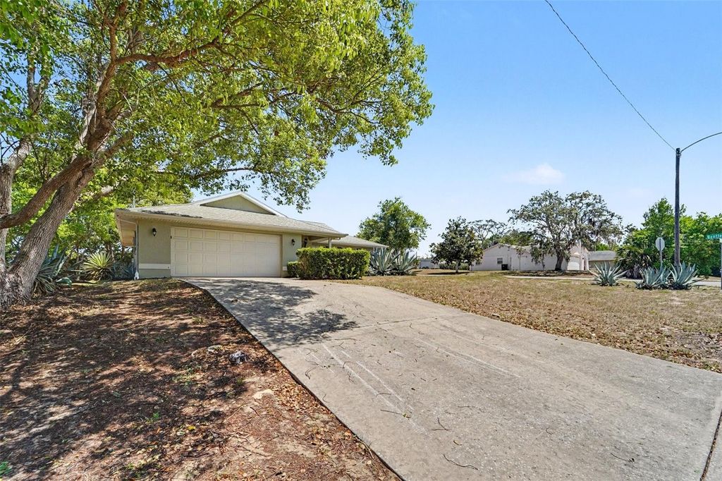 Photo of 7006 Maplehurst Drive, Port Richey, FL 34668 (MLS # O6419190)