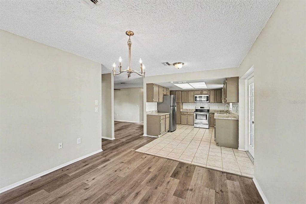 Photo of 7006 Maplehurst Drive, Port Richey, FL 34668 (MLS # O6419190)