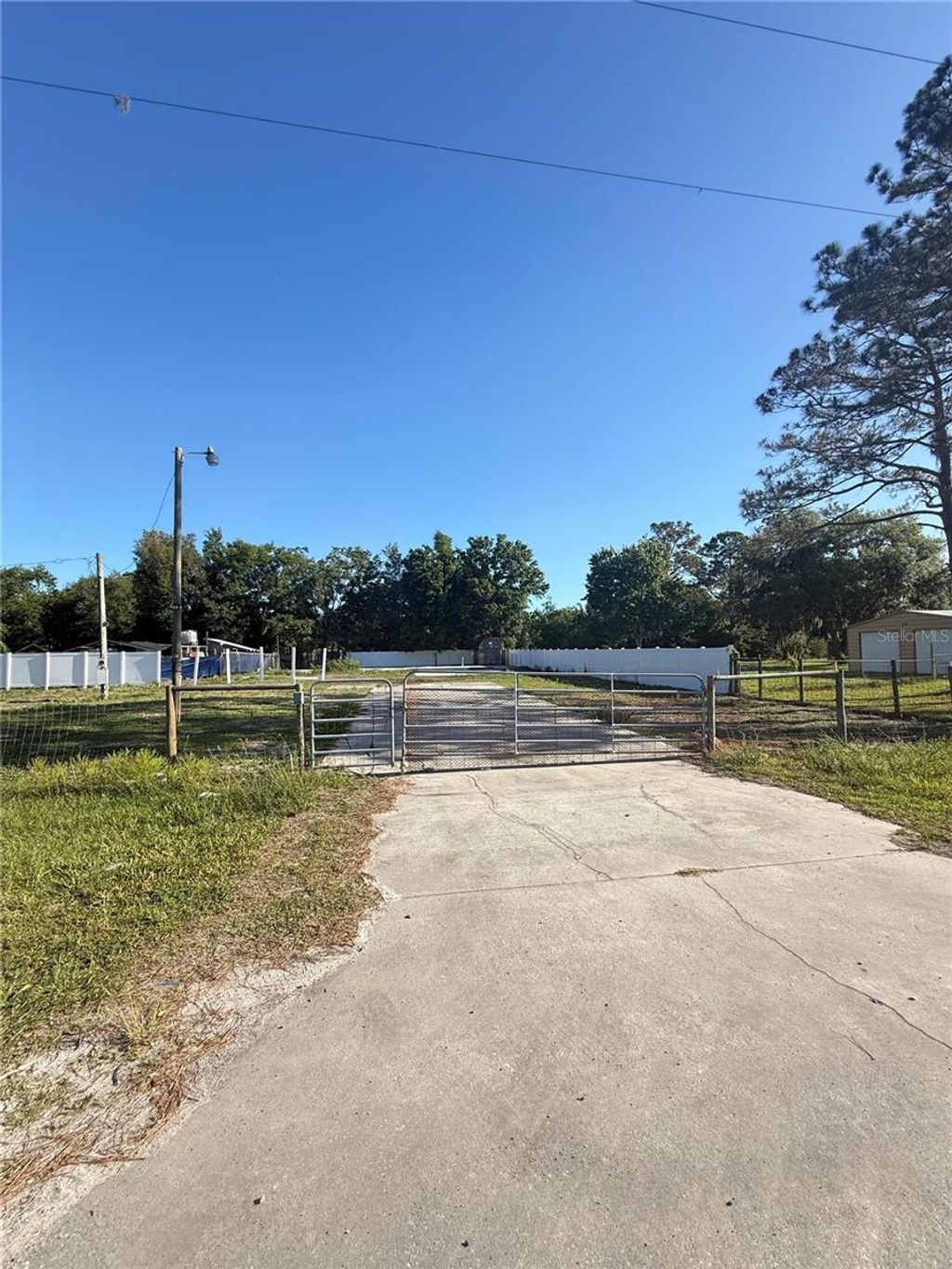 Photo of 19651 Causeway Boulevard, Land O Lakes, FL 34638 (MLS # TB8501563)