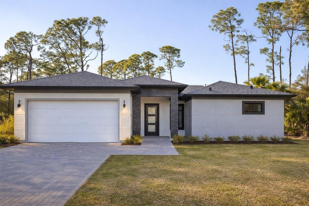 Photo of 1089 Cornelius Boulevard, Port Charlotte, FL 33953 (MLS # O6384140)