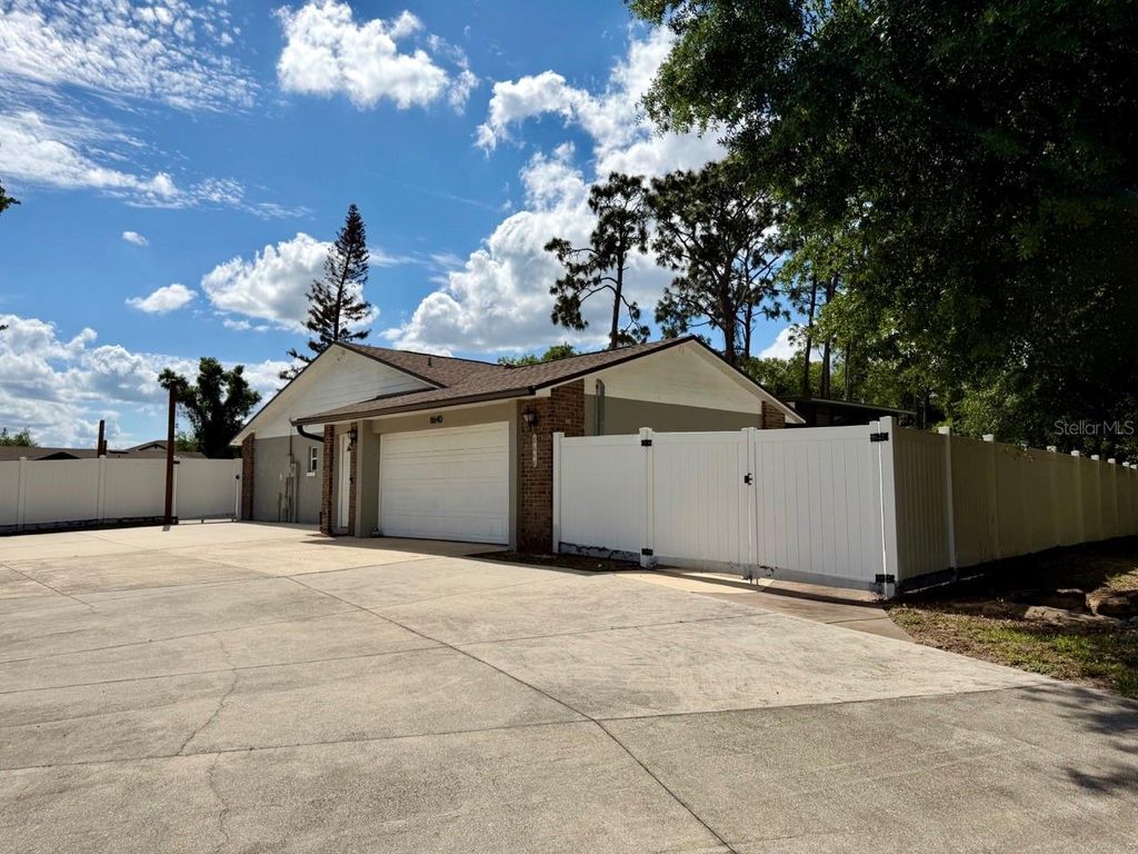 Photo of 8640 8th Street, Orlando, FL 32836 (MLS # O6401753)