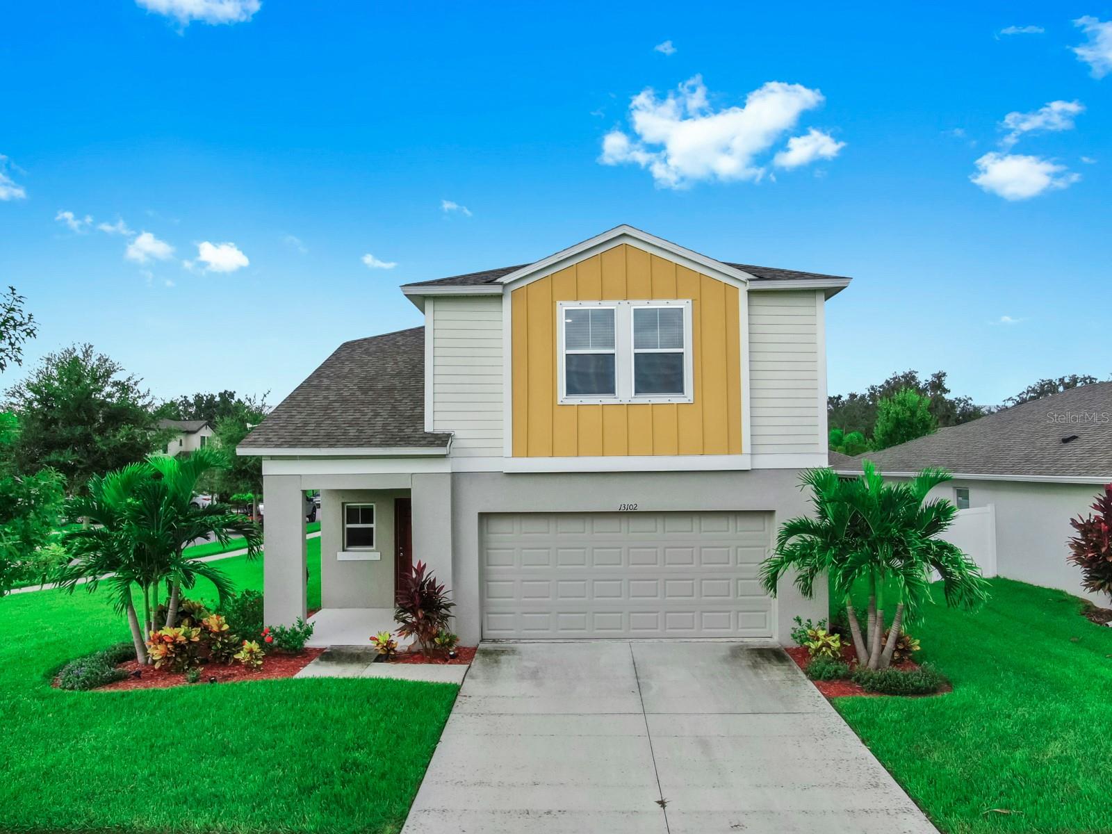 Welcome home to this BEAUTIFUL 5 bedroom, 3 bathroom Casa Fresca "Indigo" home situated on a coveted CORNER LOT at the end of a quiet cul-de-sac in the highly desirable Triple Creek neighborhood! Built in 2020, this home offers modern amenities and plenty of space, ideal for a growing family! This home has been BARELY LIVED IN, as it was a second home purchase for owners - everything still looks and feels BRAND NEW and the home has been IMMACULATELY cared for and maintained! Owners have even added a water softener system to ensure longevity of home appliances and plumbing fixtures! As you enter the home, your eyes will be drawn to the open floorpan, allowing the dining area, living room and kitchen to flow seamlessly together and to make entertaining a breeze! The gourmet kitchen features QUARTZ countertops, sleek stainless steel appliances, trendy white cabinetry, and stylish grey-hued LVP flooring. The first floor also includes a bedroom and full bathroom, which would make for a convenient guest suite. As you make your way upstairs, you are welcomed into a large loft space, perfect for use as a gaming or media center. The SPACIOUS Master Bedroom offers plenty of natural light and an ensuite fit for a king! The large LUXURIOUS bathroom includes a standing shower, his and her sinks, a commode and a walk in closet the size of a bedroom! Three additional LARGE bedrooms, a full bathroom and a convenient upstairs laundry room are also located on the second floor. This home sits on a LARGE CORNER LOT, with plenty of room and options to add a pool or lanai down the road. The home is in an ideal location in the community, conveniently situated near the community pool, elementary and pre-school, and amenity center. Triple Creek is a resort-style community offering its resident amenities like THREE community pools, TWO clubhouses, TWO fitness centers, playgrounds, basketball and tennis courts, walking trails, community events and SO MUCH MORE!