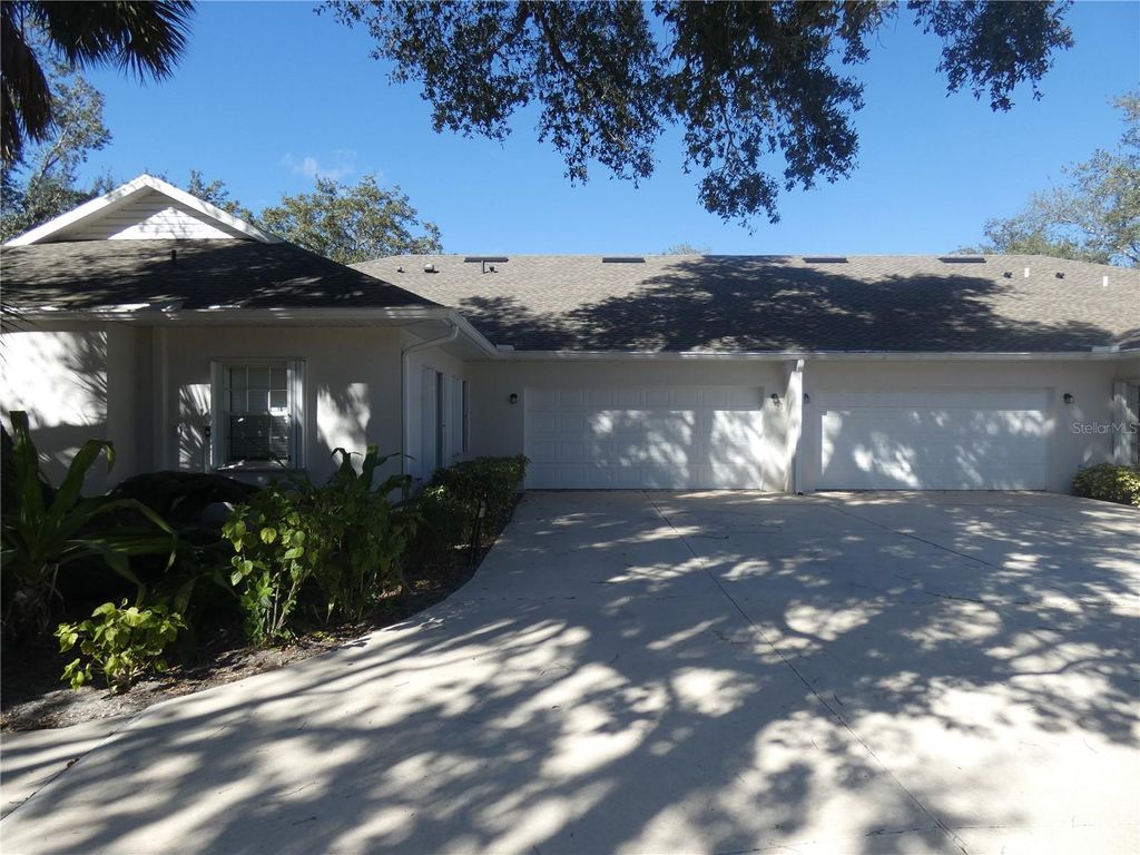 Photo of 1448 Winding Oak Drive, Port Charlotte, FL 33948 (MLS # R4910656)