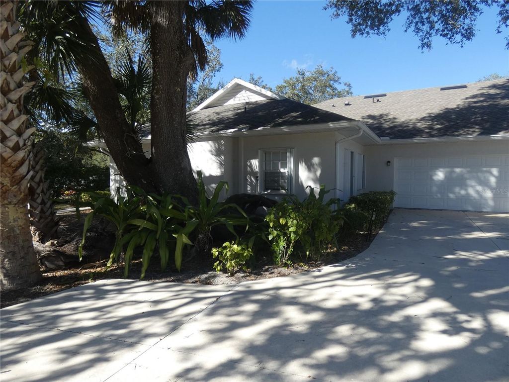 Photo of 1448 Winding Oak Drive, Port Charlotte, FL 33948 (MLS # R4910656)