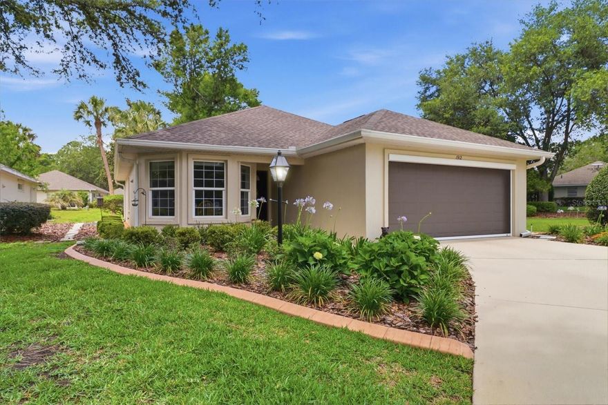 SNUG AS A BUG IN A RUG! All tucked in, this charming 2BD/2BA/2CG villa sits nestled on a small cul-de-sac, in Fox Hollow Village of the Meadowcrest Community, which is nicely positioned between CR 486 and SR 44, and only 5 minutes from the NEW Suncoast Parkway Extension! With its locational convenience, park-like atmosphere & multitude of amenities, this MAINTENANCE FREE community has become a highly sought after treasure! And it gets better! This villa’s comfortable floor plan features effective space utilization and a smooth transition from room to room maximizing its spaciousness. The natural light streaming in from the plentiful dual pane vinyl windows, the FRESHLY PAINTED interior and the NEW LUXURY VINYL PLANKING provide continuity throughout. The NEWLY UPDATED, L-shaped kitchen boasts plenty of white cabinetry, granite countertops, stainless steel appliances and a bright & cheery eating space where you can enjoy the start of your day with a morning cup of coffee. The dining/living room combo is at the heart of the home where memories are created, stories shared and laughter emanates. The master bedroom offers a walk-in closet, a second additional closet, both with organizers & a NEWLY UPDATED ensuite boasting a white vanity with granite top, tiled shower, new faucets and linen closet. Guests will feel comfortable and right at home with a guest bedroom that offers its own private, NEWLY UPDATED ensuite and built-in shelving for useful storage. The outside is just as pleasing as the inside with the FRESHLY PAINTED exterior, a NEW fully landscaped yard with irrigation system, and NEW decorative curbing. The NEW retractable garage screen and new gutter leaf guards are a plus! ROOF in 2019 & HVAC in 2022. NO FLOOD ZONE! So much to do in a community where neighbors are friends! The clubhouse features a library, billiards room, kitchen & dance floor for parties, 2 beautiful swimming pools, lighted tennis/pickleball courts, shuffleboard/bocce ball courts & a pond w/ fountain & gazebo; all surrounded by winding, walking trails. Centrally located among restaurants, schools & shopping with Citrus County’s BRAND-NEW RETAIL HOTSPOT, The Shoppes at Black Diamond, just 6 minutes away. Only 5 miles to Three Sister Springs & Hunter Springs Park for boating, fishing & the only place to SWIM W/ THE MANATEES! FREE 1-year HOME WARRANTY for PEACE OF MIND is OFFERED to the BUYER!