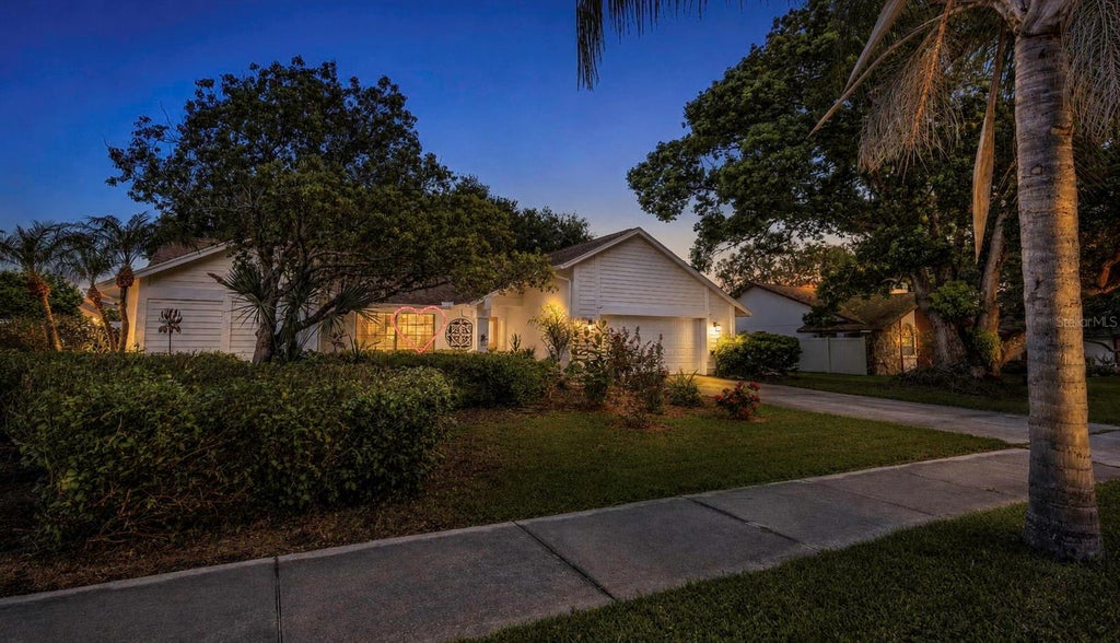Photo of 1620 Country Lane, Dunedin, FL 34698 (MLS # TB8543255)