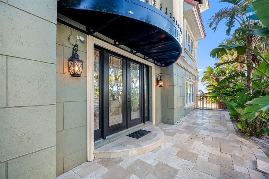 This exquisite home is surrounded by the aqua blue waters of the Gulf of Mexico and the white sandy beaches of the quant community of Indian Rocks Beach. The Tuscan-style design blends classical architectural elements with modern touches and conveniences. The beveled glass double door entry directs you into a world with a sweeping staircase, Travertine marble and bamboo flooring, 10 ft. ceilings, 8 ft. doors and masterly crafted woodwork throughout.  The richly paneled elevator transports its passengers all the way up to the roof top level and its panoramic views. This home has a 2-stall garage, 4 spacious bedrooms, 4 full baths in addition to an elegant powder bath and comprises of 3 levels of over 4200 sq. ft. of air condition space starting with the game and bonus rooms and their direct access to the expansive pool deck.  The 14’ x 20’ bonus room’s location would accommodate a well-equipped gym, wine cellar or air conditioned storage for paddle boards, bikes and other beach toys.  The second-floor main living area’s great room is 34 ft. wide and offers panoramic Gulf views plus its equally wide balcony has a spiral staircase that leads directly to the pool area.  The “name dropping” kitchen showcases Wolf, Sub-Zero and Bosch and the adjacent butler’s pantry and wet bar is an enticement to be led into the multi-level media room. Also, on the second level is a spacious guest bedroom and en suite bath.  Ready to relax … the sweeping staircase provides an elegant way to ascend to the third level for a respite in the 650 sq. ft. Gulf front master suite with its 15 x 15 walk-in closet, adjoining office, an elaborate master bath with Gulf views and a 22 ft. wide private balcony. The third level also has a beautiful wet bar, the laundry room, 2 guest bedrooms and their en-suite bathrooms.  The spacious Travertine marble pool deck offers a private beach access, a large free-formed pool, a spa and provides shaded areas for those who want to enjoy the beach front but limit their time in the sun. This home is conveniently located and is within walking distance to many of the area’s popular restaurants and boat and bike rentals.  St. Petersburg-Clearwater Airport is a 25-minute commute and the Tampa International Airport is approximately 45 minutes away. View the video of this exquisite property at https://vimeo.com/914275064