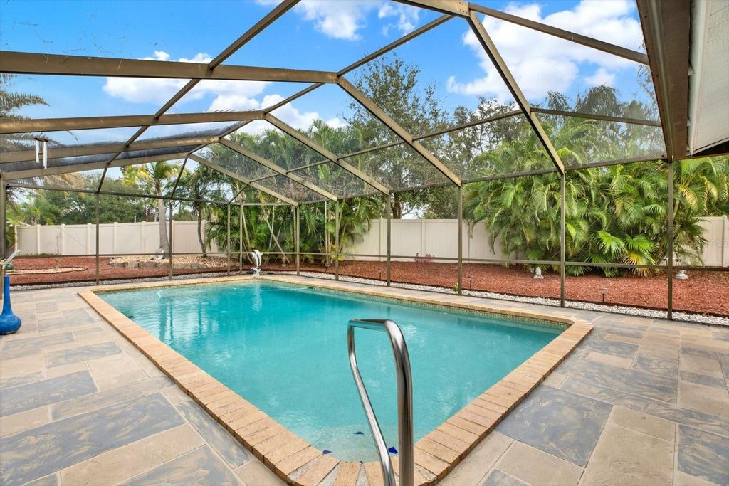 Photo of 13400 Rustic Pines Boulevard S, Seminole, FL 33776 (MLS # TB8465095)