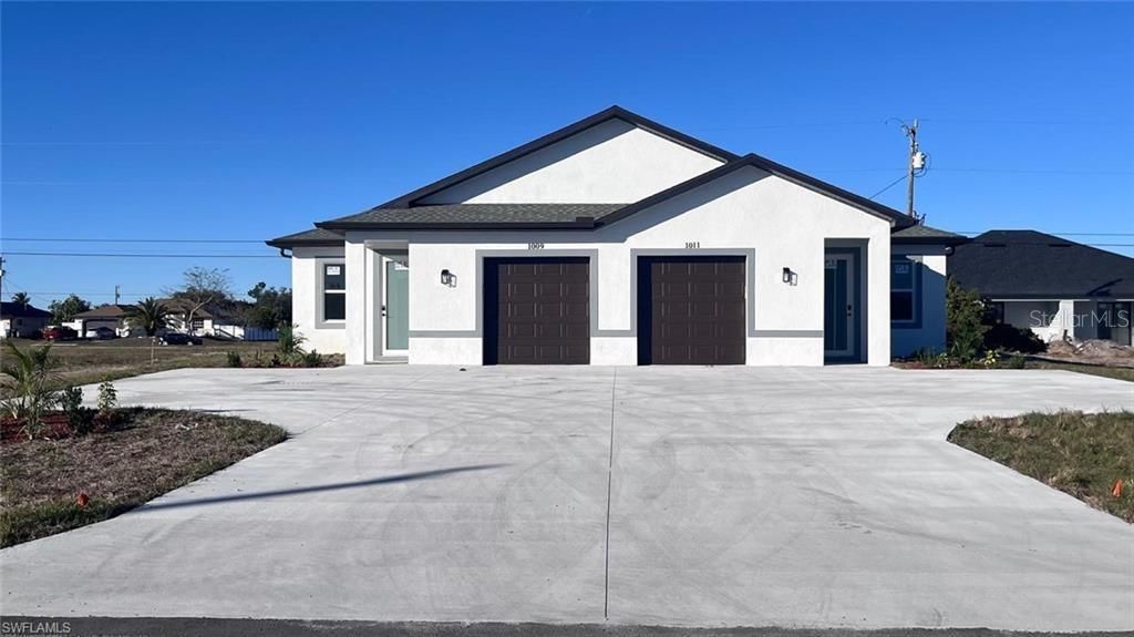 Photo of 1009 NE 15th Ln St, Cape Coral, FL 33909 (MLS # A4685763)