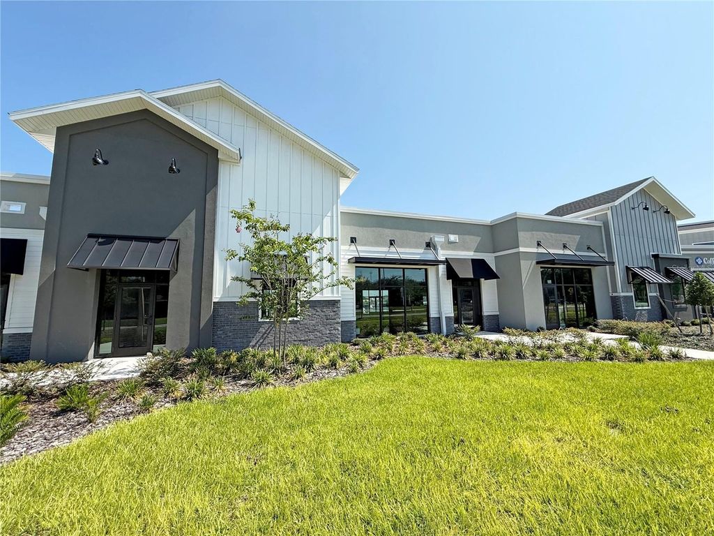 Photo of 12143 Stoneybrook West Parkway #101-102, Winter Garden, FL 34787 (MLS # O6428942)