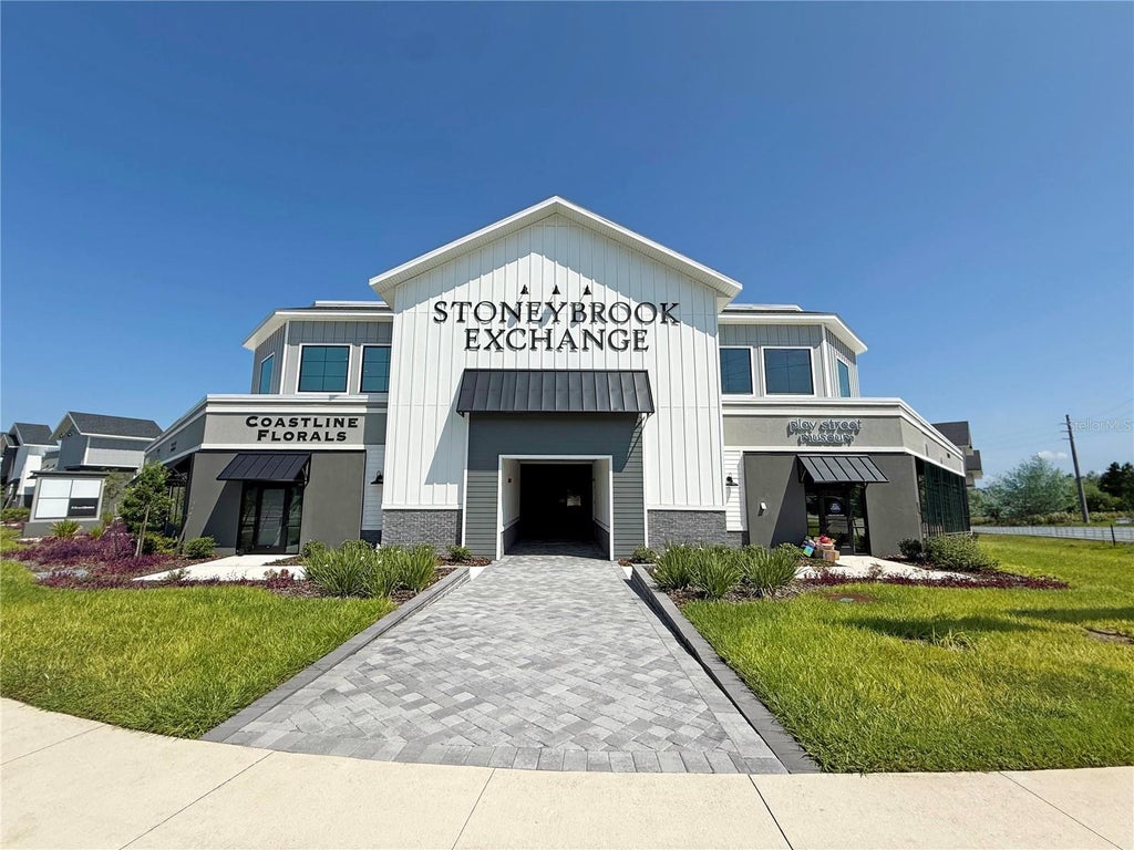 Photo of 12143 Stoneybrook West Parkway #101-102, Winter Garden, FL 34787 (MLS # O6428942)