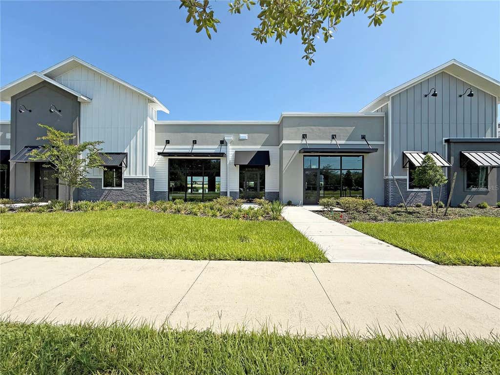 Photo of 12143 Stoneybrook West Parkway #101-102, Winter Garden, FL 34787 (MLS # O6428942)