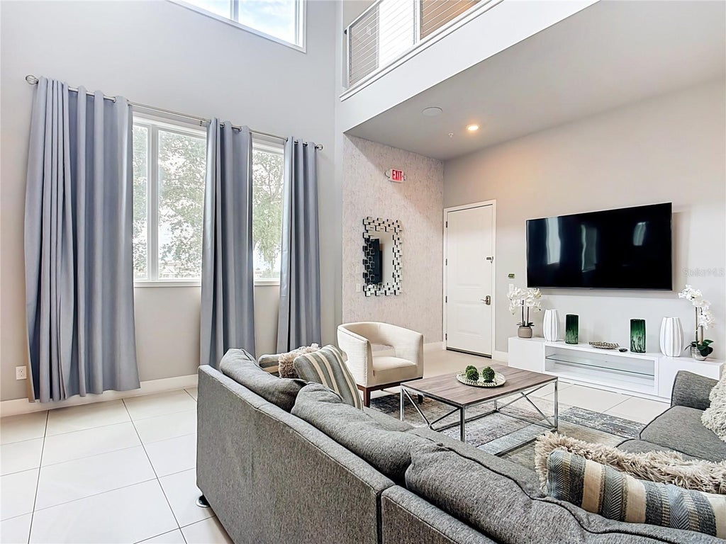 Photo of 7740 Sandy Ridge Drive #215, Kissimmee, FL 34747 (MLS # TB8543178)