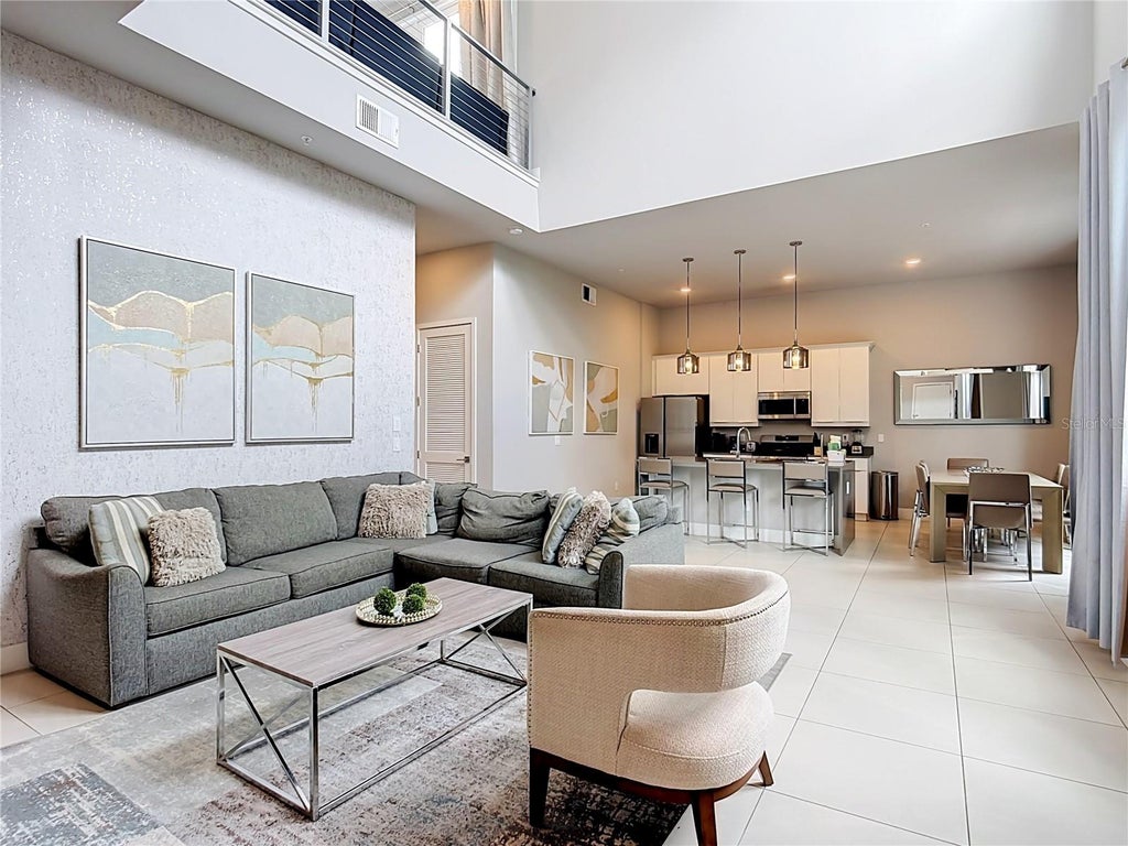 Photo of 7740 Sandy Ridge Drive #215, Kissimmee, FL 34747 (MLS # TB8543178)