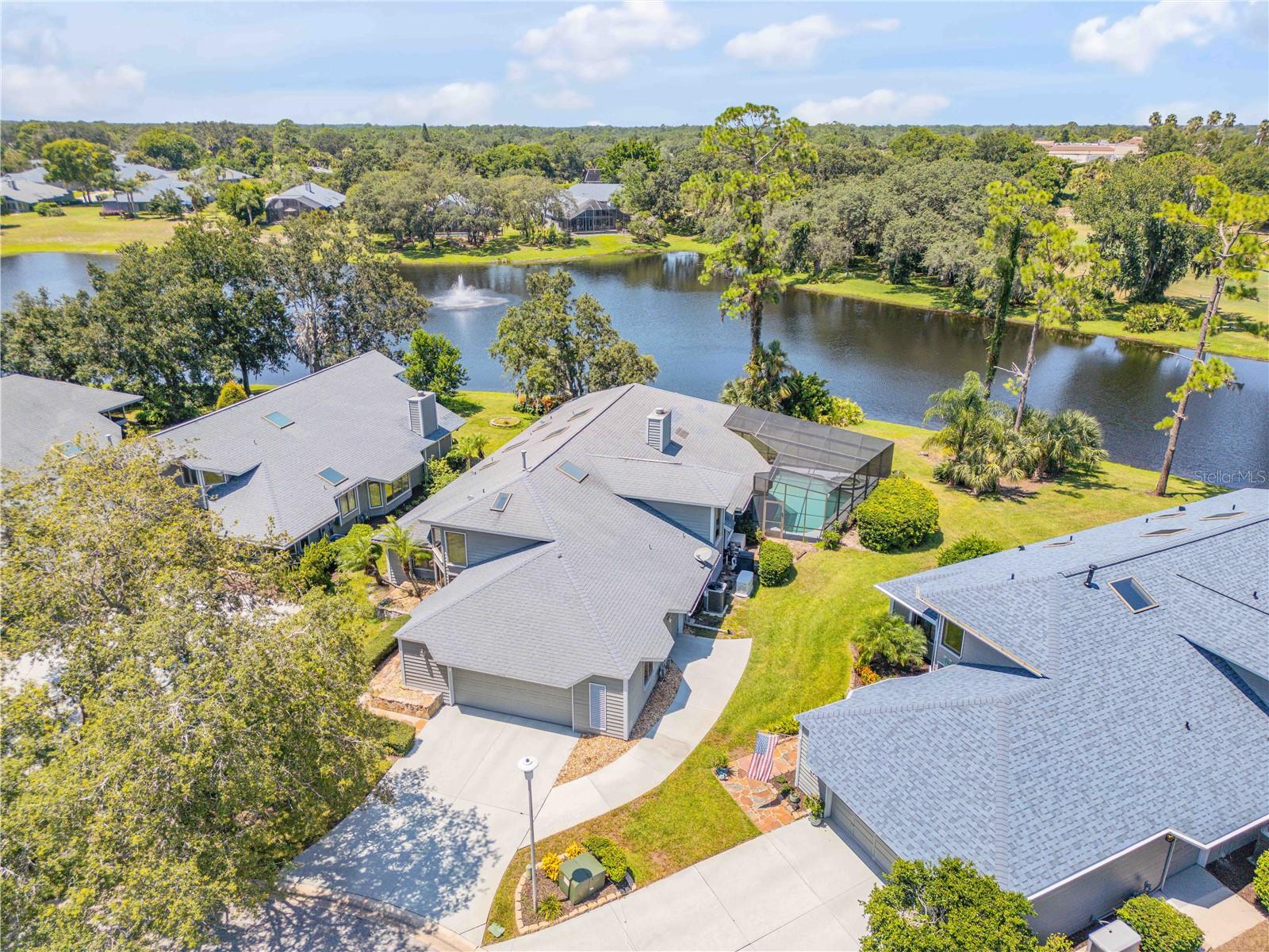 Refined Golf Course Retreat with Extensive Upgrades. An exceptional opportunity awaits in the gated Meadows at Sugar Mill Country Club, where this custom residence blends Elegant Design with a complete 2025 Style Renovation. Situated on what many consider the community’s best Pond and Golf Course View, the home enjoys a tranquil Water and Fountain Vista from a private, screened Lanai with Pool and Spa. The brand New Roof (2025) includes nine Skylights, bringing Natural Light throughout the living areas.
Inside, virtually every surface has been refreshed. The interior and exterior are Newly Painted, and popcorn ceilings were painstakingly removed in favor of Knockdown Finish. New flooring, a tasteful mix of tile and plush carpet, complements 5 ¼" Baseboards and new Interior and Exterior Doors. All light fixtures and fans have been replaced, and three Bathrooms have been fully renovated. A Custom Built Primary Closet elevates the Owner’s Retreat. The LG Washer and Dryer convey with the home, and the kitchen features a new Gas Range, Range Hood, Dishwasher, tile backsplash and upgraded appliances. HVAC and Water Heater replaced 2023.
This 3 bedroom, 3.5 bath floor plan is perfect for Entertaining. Upstairs the Loft offers space for a second Primary Suite, while the main level Owner’s Retreat boasts a Spa-Inspired Bath. The oversized 2+ car garage includes its own Golf Cart Bay with its own Access Door.
The Outdoor Living has been completely transformed. A new Screen Enclosure with 20/20 Micro-Mesh keeps out No-See-Ums while still allowing gentle breezes. The Salt Water Pool and Spa now feature full Automation and a brand new Pool Pump, and a Marine Grade Blaze Grill anchors the Summer Kitchen. Natural Gas serves the Grill, a Cozy Fireplace, and the Generac Whole House Generator, providing peace of mind.
Community Life at The Meadows of Sugar Mill is second to none. The HOA Fee includes security gate, yard maintenance, irrigation, High Speed Internet, Basic Cable with a Premium Movie Channel and Exterior Pest Control, perfect for a Lock and Leave Lifestyle. Located within Sugar Mill Country Club, a premier private community featuring 27 Championship Holes designed by Joe Lee, with Optional Membership Tiers that include Golf, Tennis, Pickleball, Dining, Fitness, and Pool.
With its comprehensive list of Upgrades and Unbeatable Views, this home is truly Move-In Ready. Be sure to check out our Video Walkthrough of this Beautiful Home. Schedule your Private Tour today and experience the New Smyrna Beach Lifestyle at its Finest.