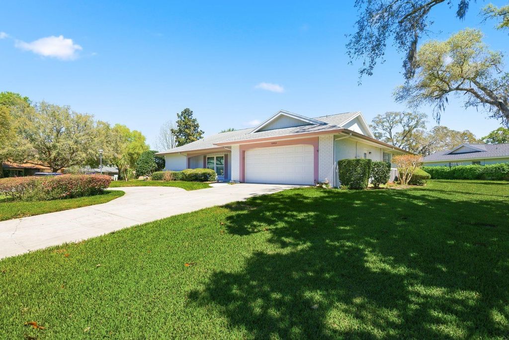 Photo of 12802 Ironwood Circle, Hudson, FL 34667 (MLS # TB8506025)